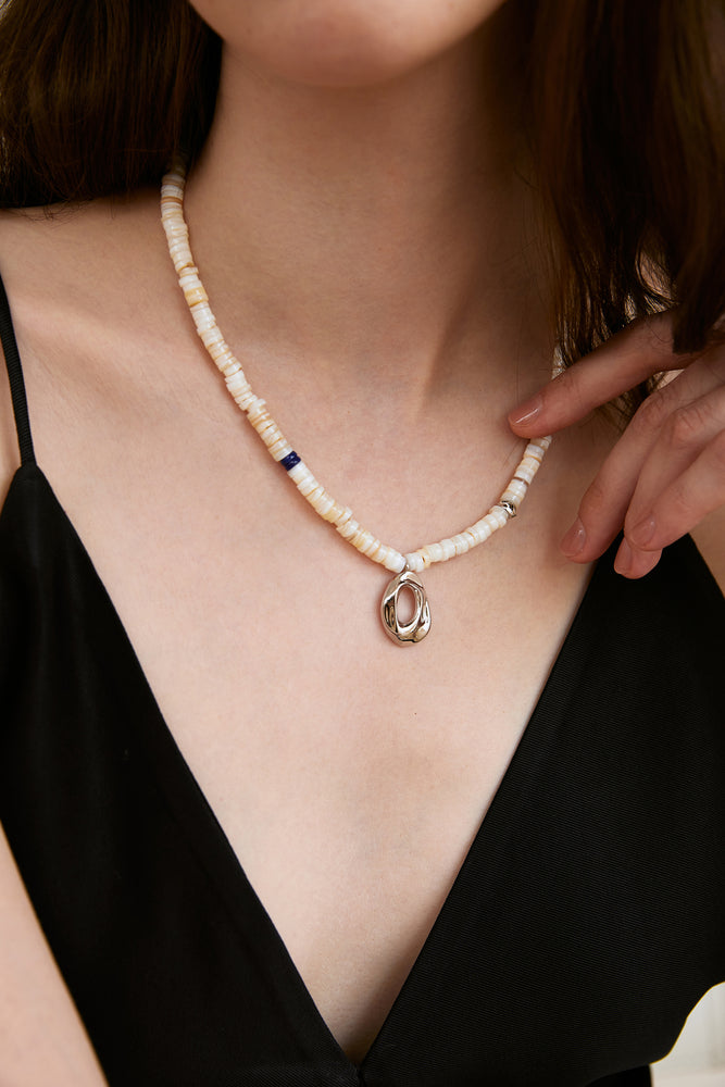 
            
                Load image into Gallery viewer, Mother of Pearl Shell Cave Necklace
            
        