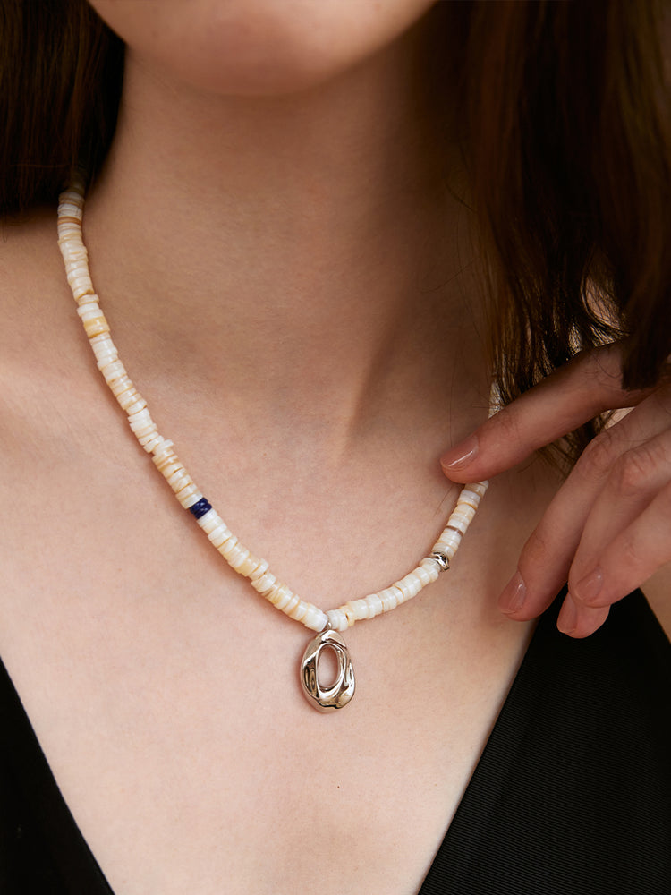 
            
                Load image into Gallery viewer, Mother of Pearl Shell Cave Necklace
            
        