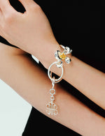 MULTI-LEVEL FLOWERS TAG BRACELET