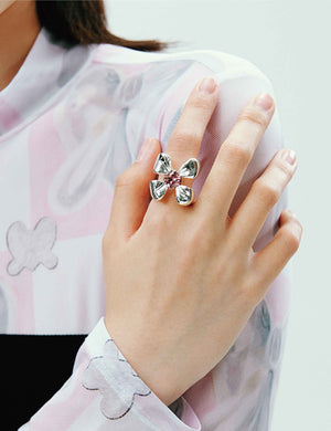 FOUR-CLAW RING