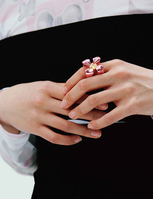 FOUR-CLAW RING