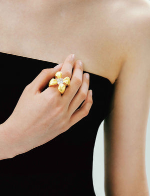 FOUR-CLAW RING