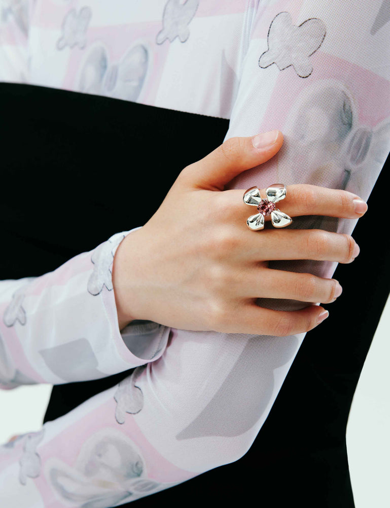 FOUR-CLAW RING